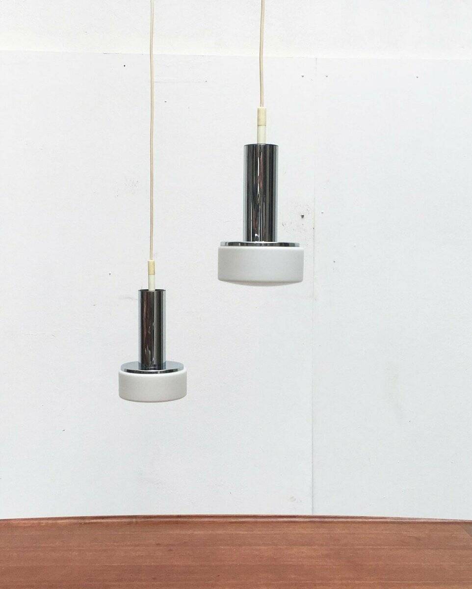 Suspended glass and chrome lamps model P105 German Mid-Century Space Age from the 1960s by Staff, set of 2.