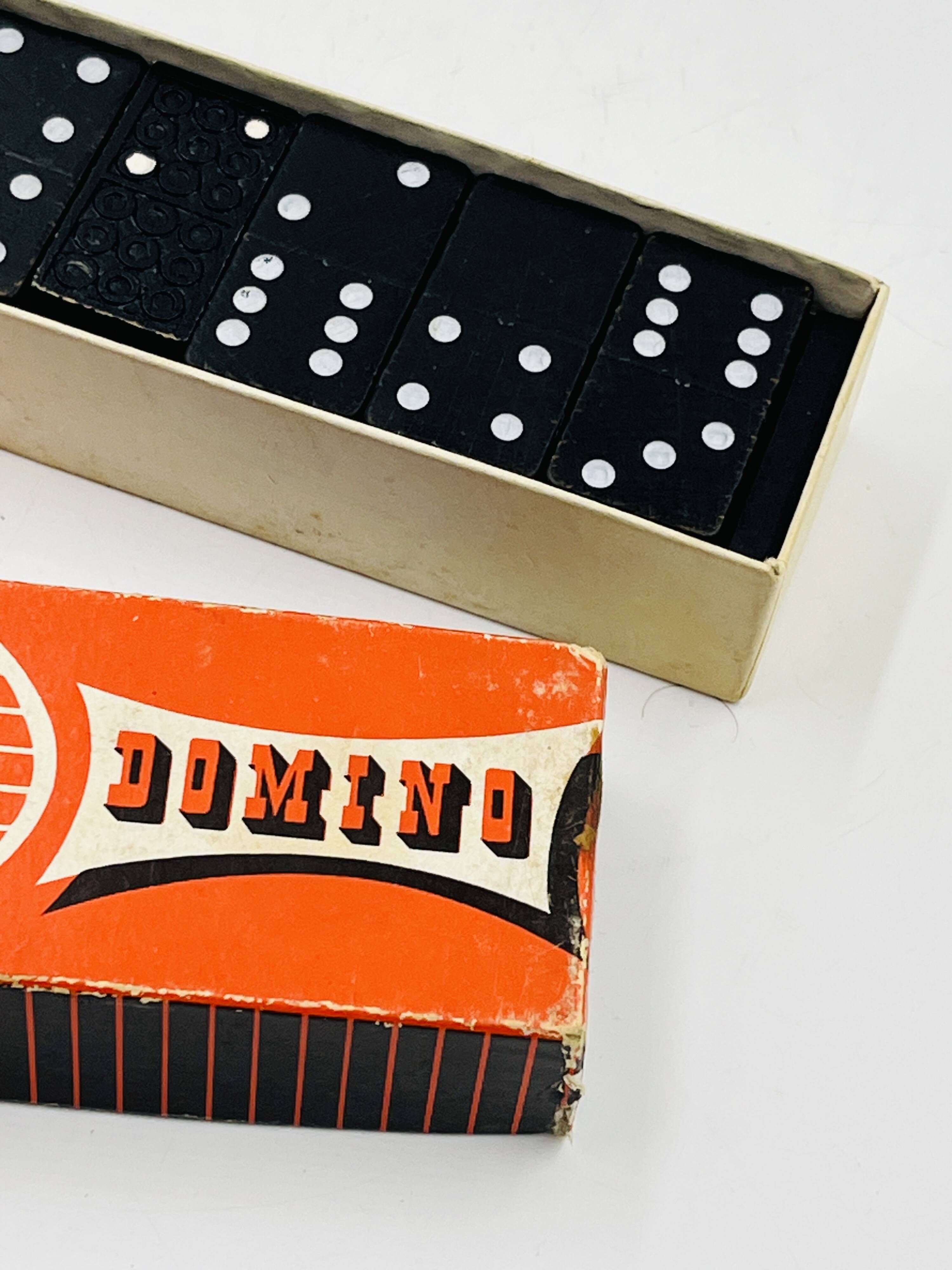 Complete vintage domino set with original box.