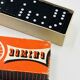 Complete vintage domino set with original box.
