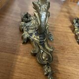 Pair of Art Nouveau wall sconces in bronze