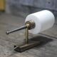 Brass wall light, black lacquered metal and white opal glass, 50s.