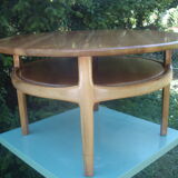 Round coffee table in solid walnut double tray of the 1970s