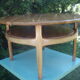 Round coffee table in solid walnut double tray of the 1970s