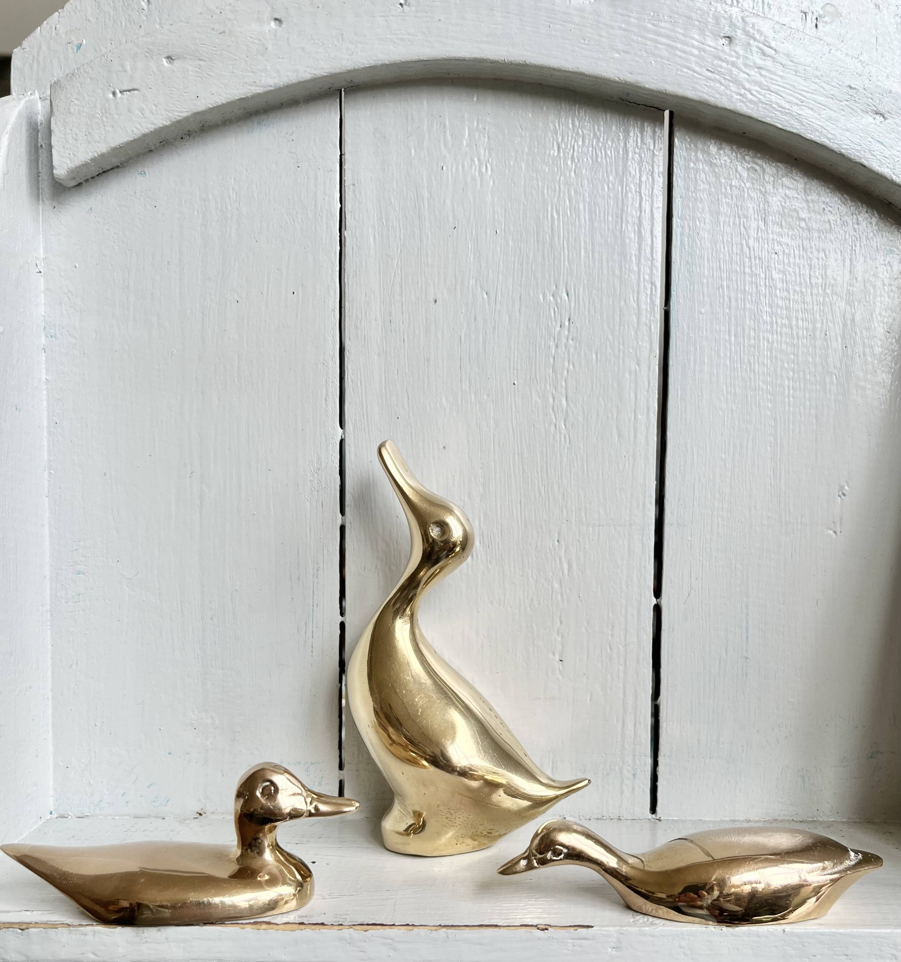 Three ducks or trio in solid brass