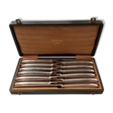 12 silver metal knives