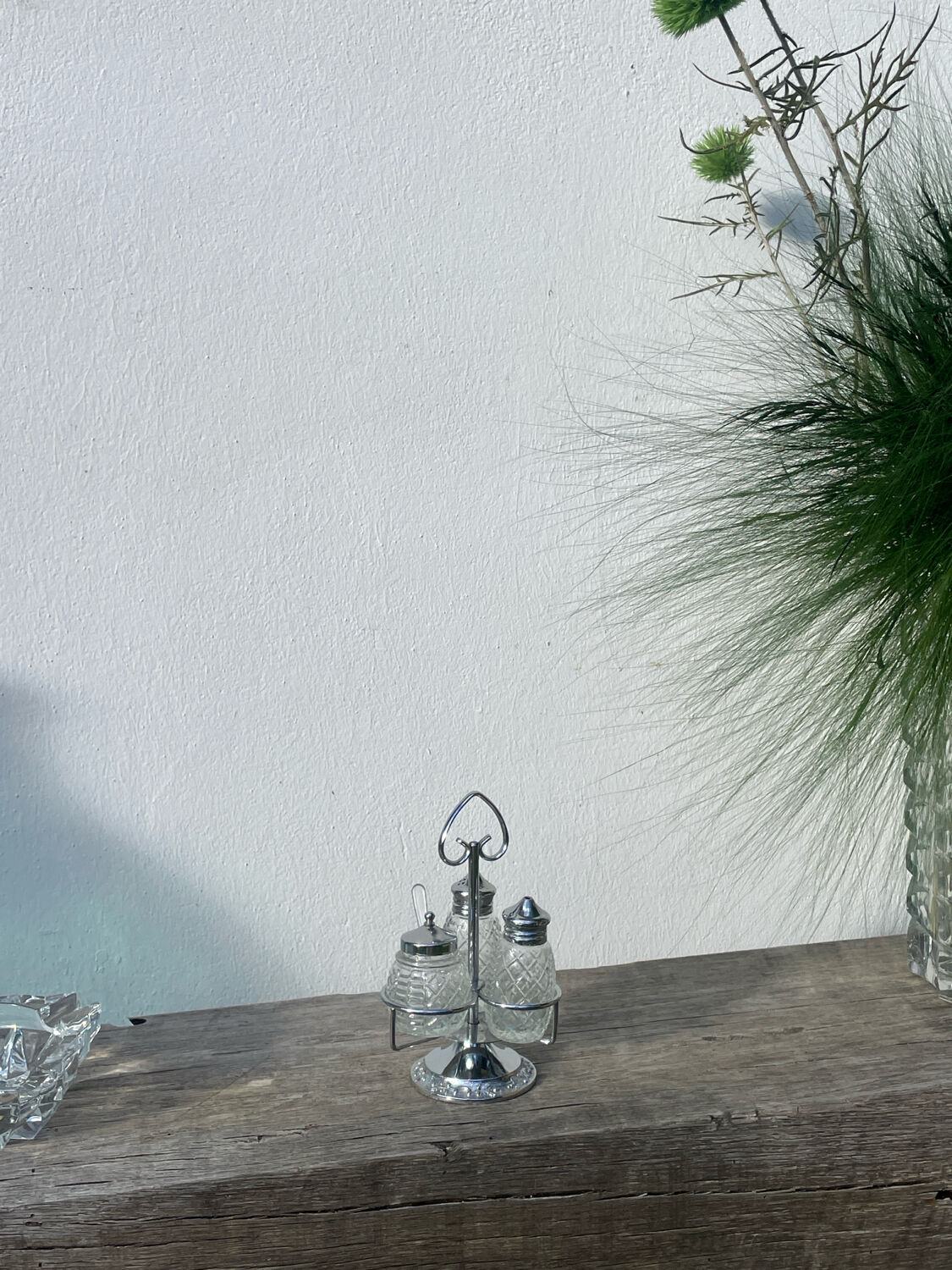 Silver-plated metal and glass salt and pepper shakers