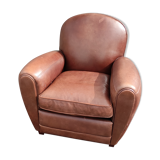 Club chair in brown leather