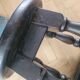 Antique wooden stool with turned legs.