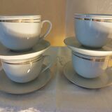 Set of 4 white and gold porcelain cups