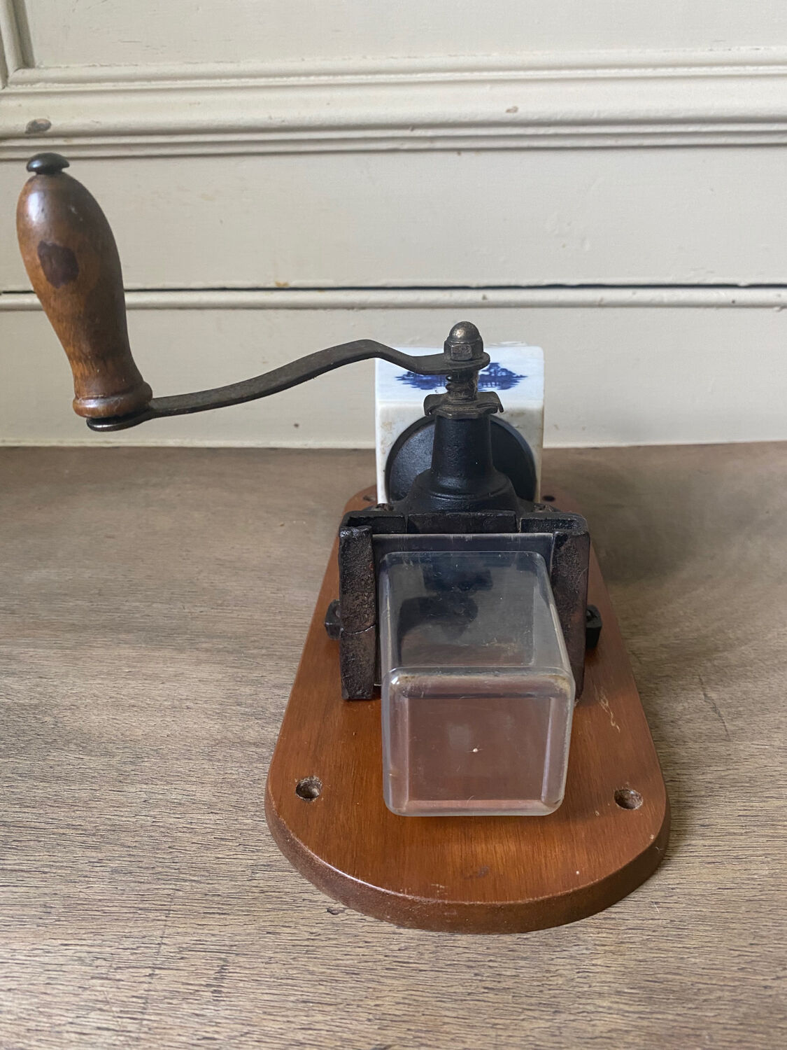 Old wall-mounted coffee grinder