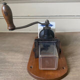 Old wall-mounted coffee grinder