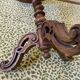 Carved wooden pedestal table