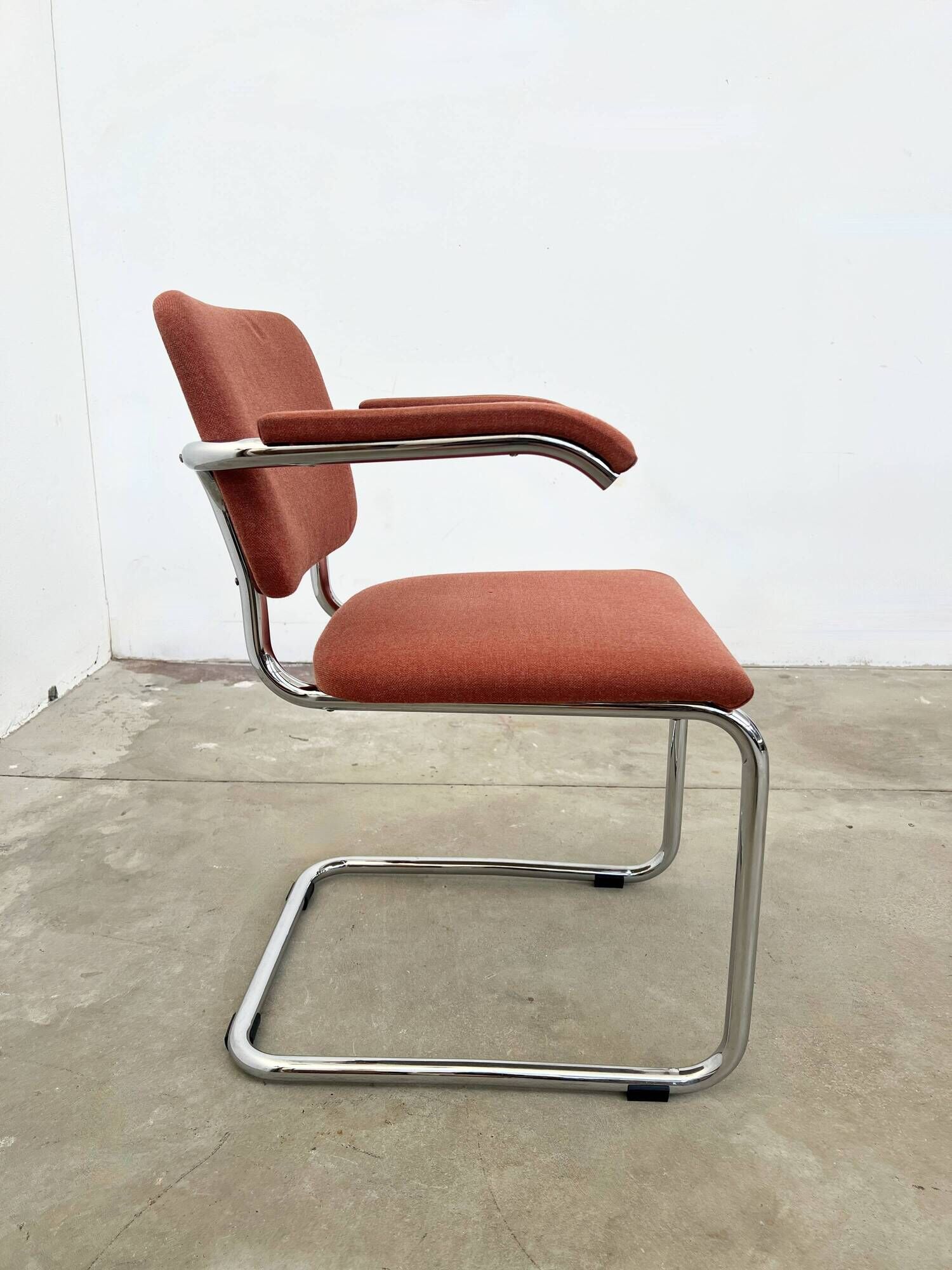Pair of Marcel Breuer B64 Knoll armchairs in coral fabric