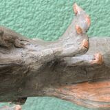 Lamp base in sculpted terracotta featuring birds, signed.