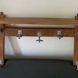 Wall-mounted coat rack with vintage hooks