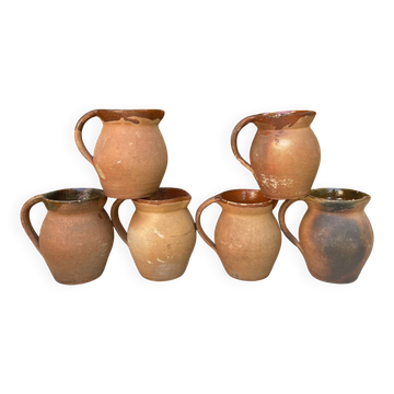 set of terracotta jugs country style