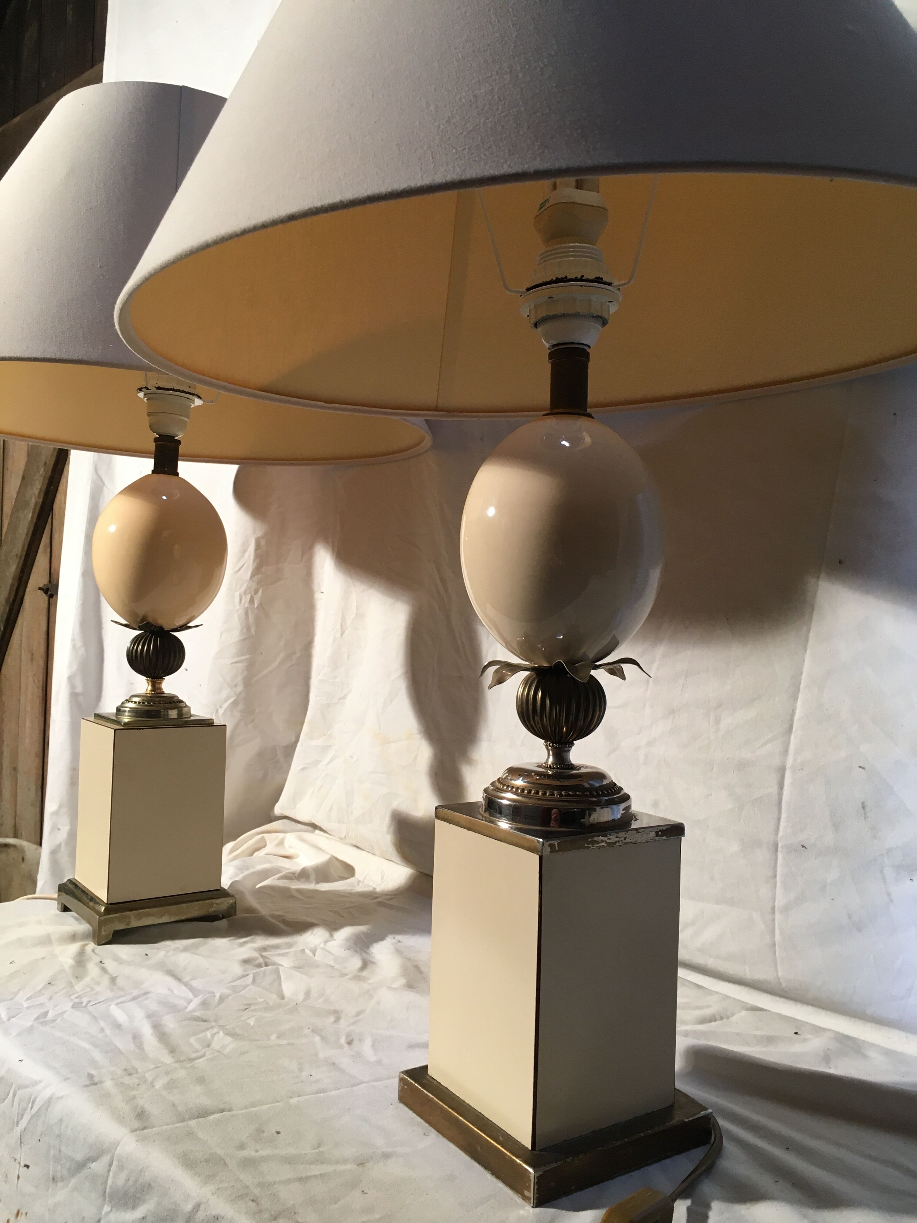 Pair of Hollywood Regency style egg lamps