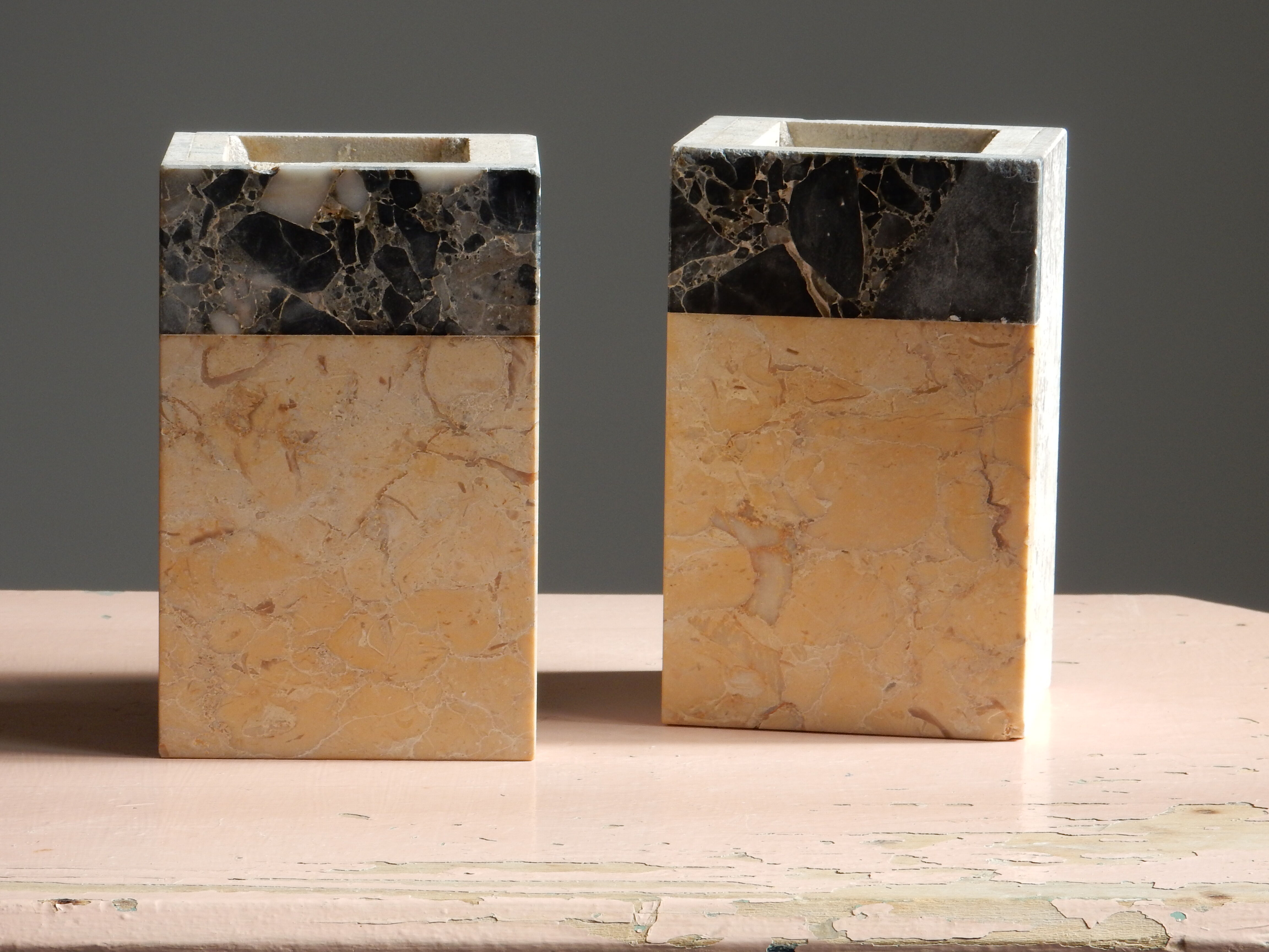 Pair of travertine and granite vases Art Deco