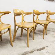 Set of 4 bistro armchairs with armrests from the 1960s.
