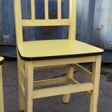 Pair of wooden and yellow formica chairs