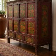 Antique Japanese wooden sideboard with hand-painted floral decorations.