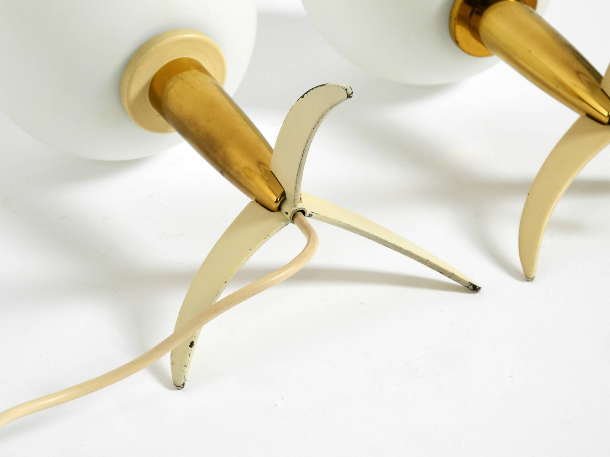 Two Mid-Century Modern rocket table lamps in brass and glass