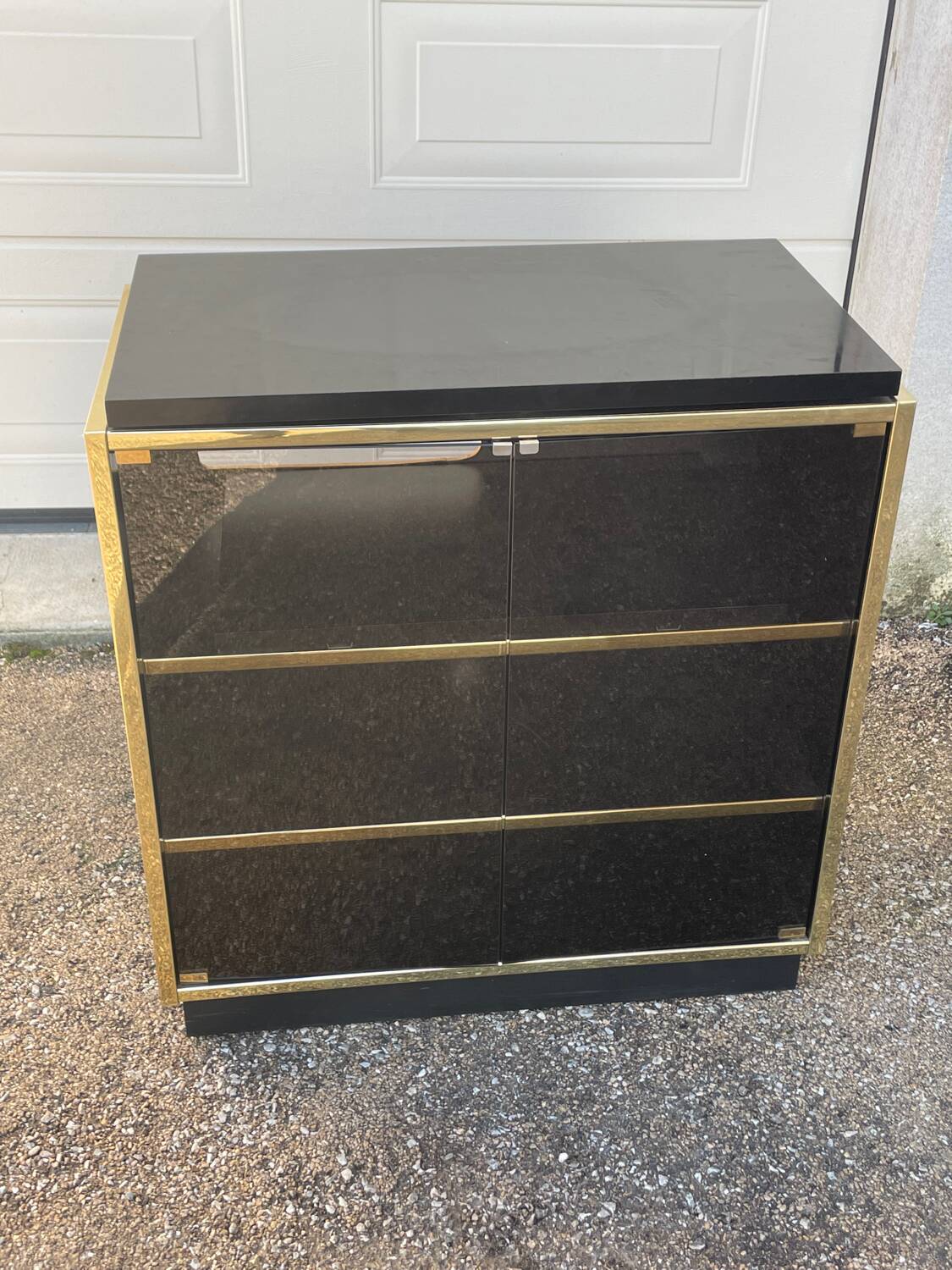 Vintage black and gold TV cabinet from the 70s/80s