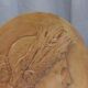 Plaster medallion, high relief, yellow ochre patina, representing the Roman divinity Ceres