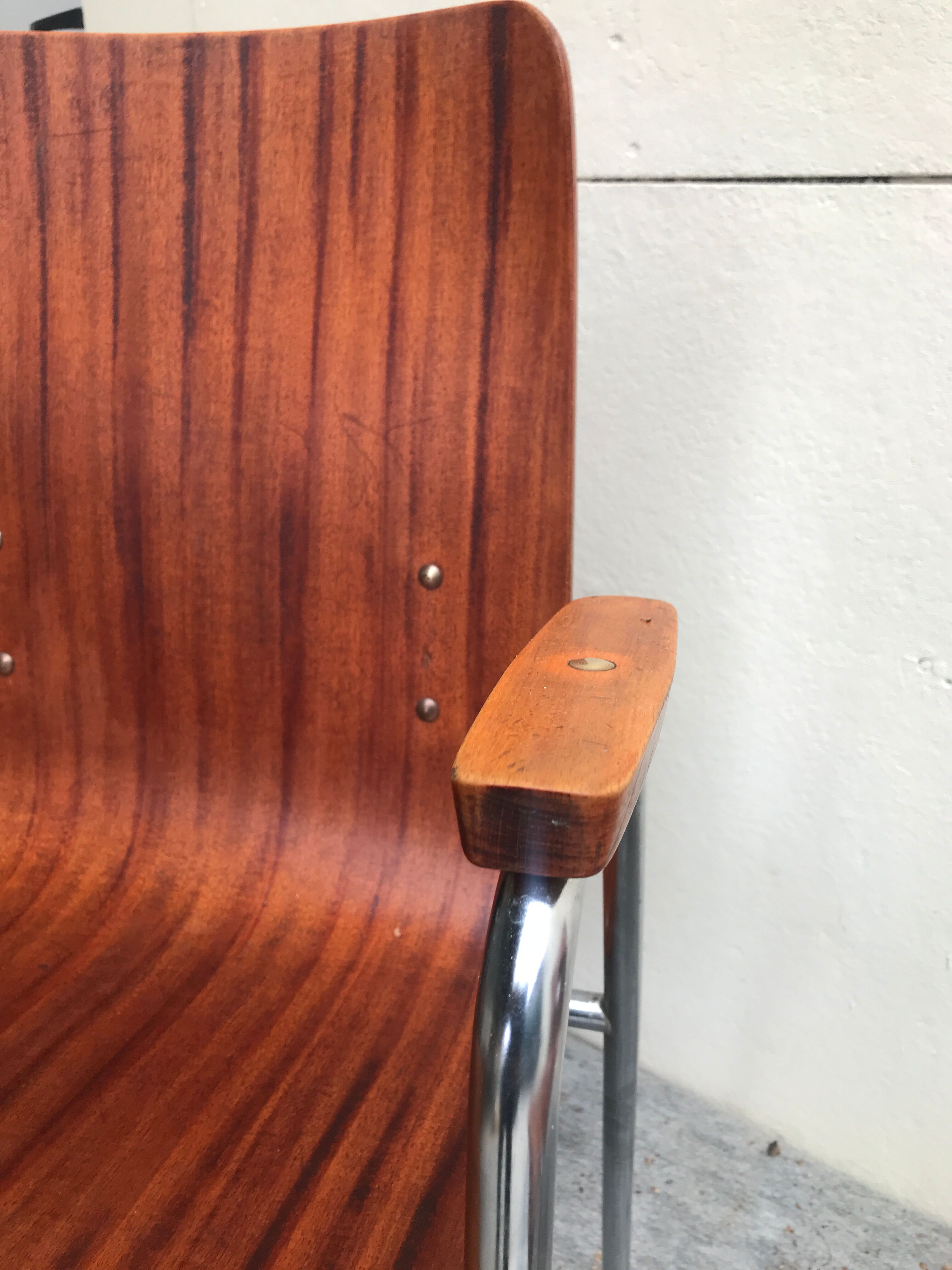 Chairs with multi-fold wooden armrest