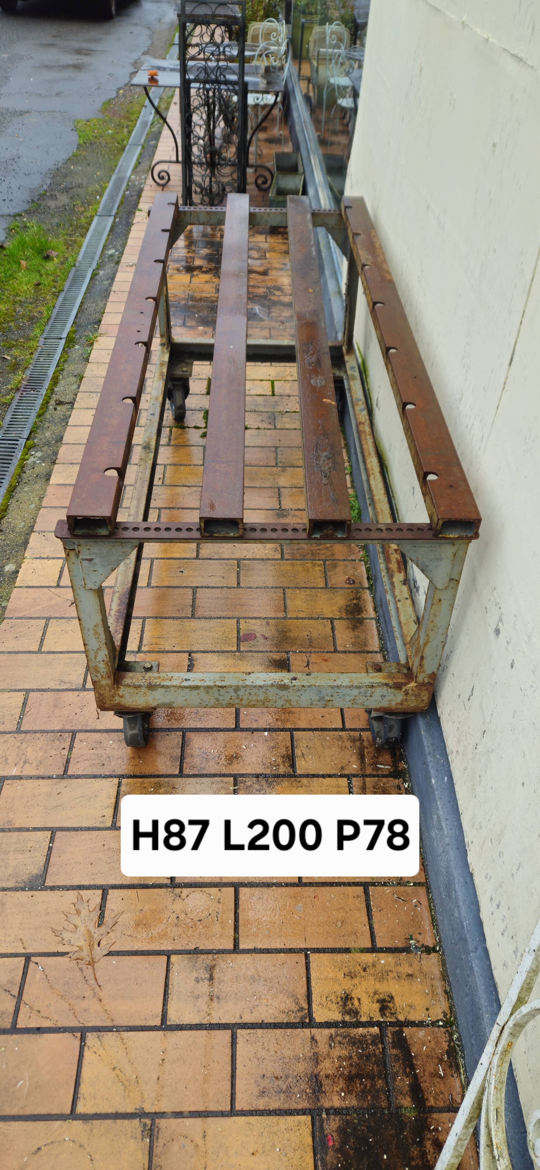 Metal industrial table on wheels, mid-20th century