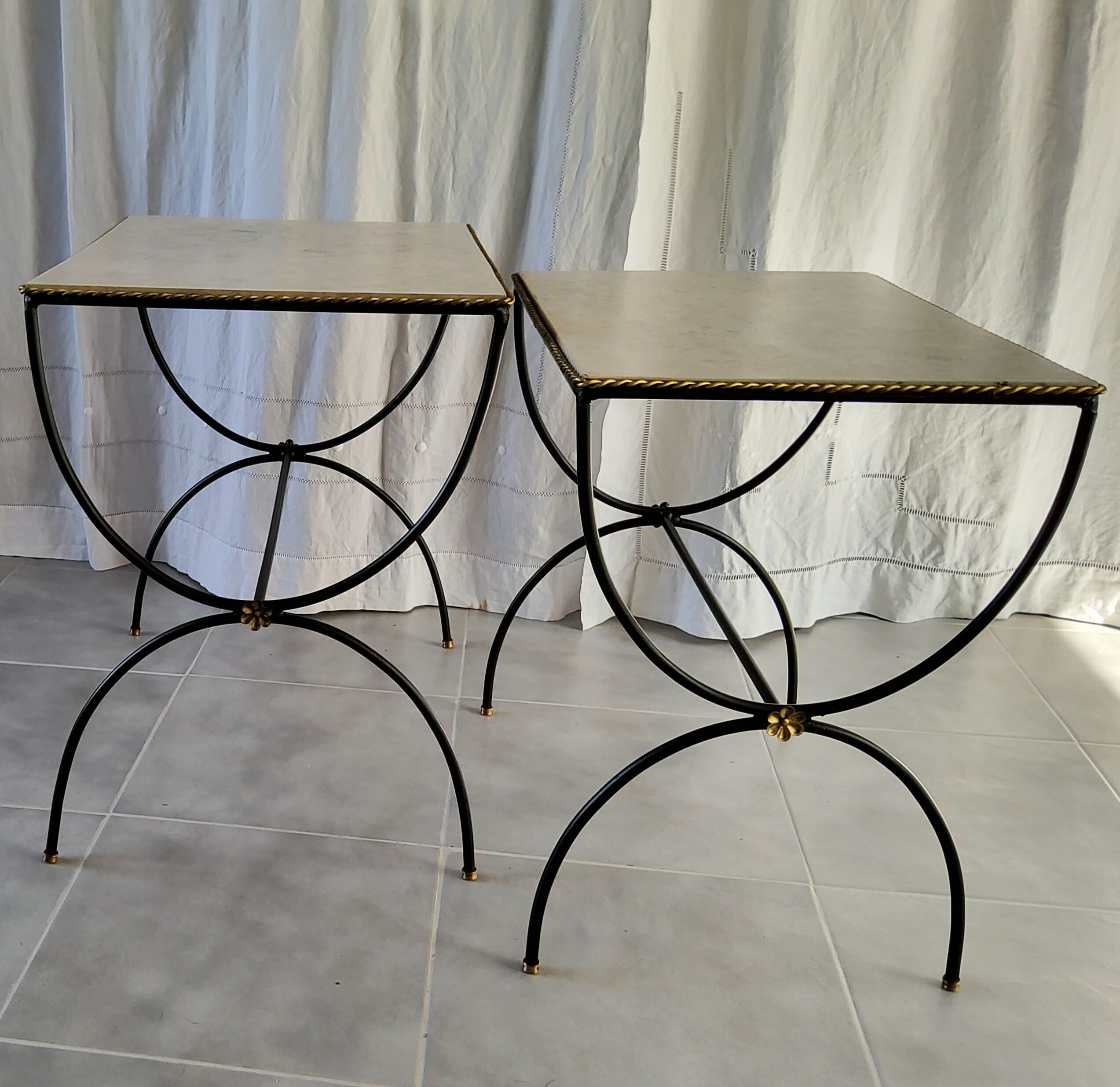 Pair of curule nesting tables