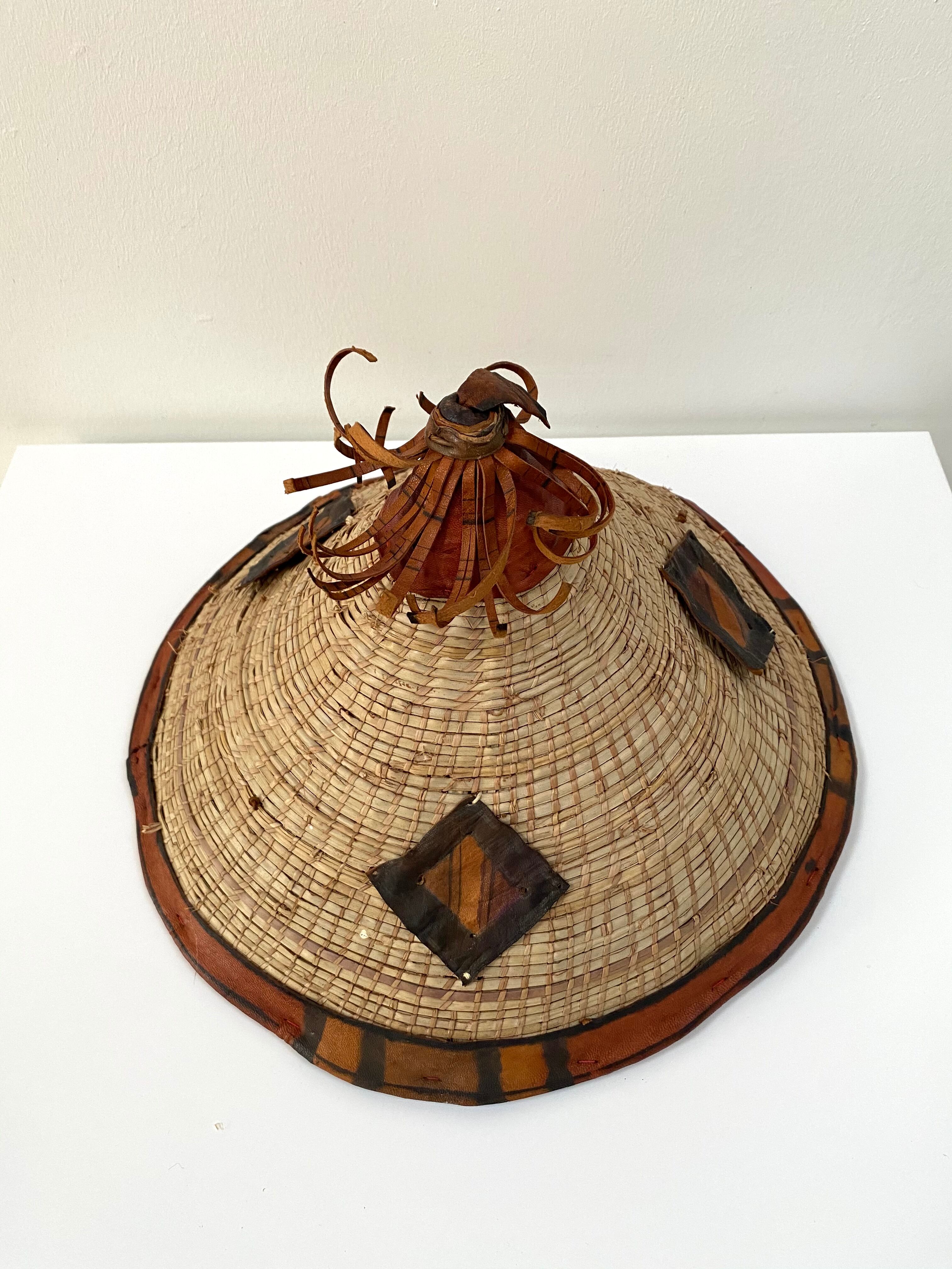 Traditional African Fulani hat in leather and woven straw