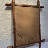 Vintage wooden mirror imitating bamboo