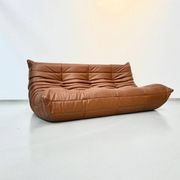 Three-seater Togo sofa in dark cognac leather by Michel Ducaroy for Ligne Roset.