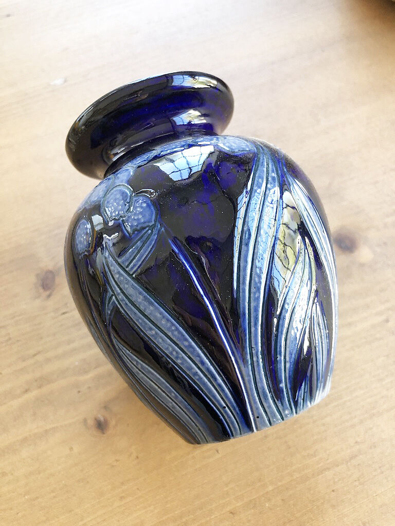 Artisan vase with floral motifs