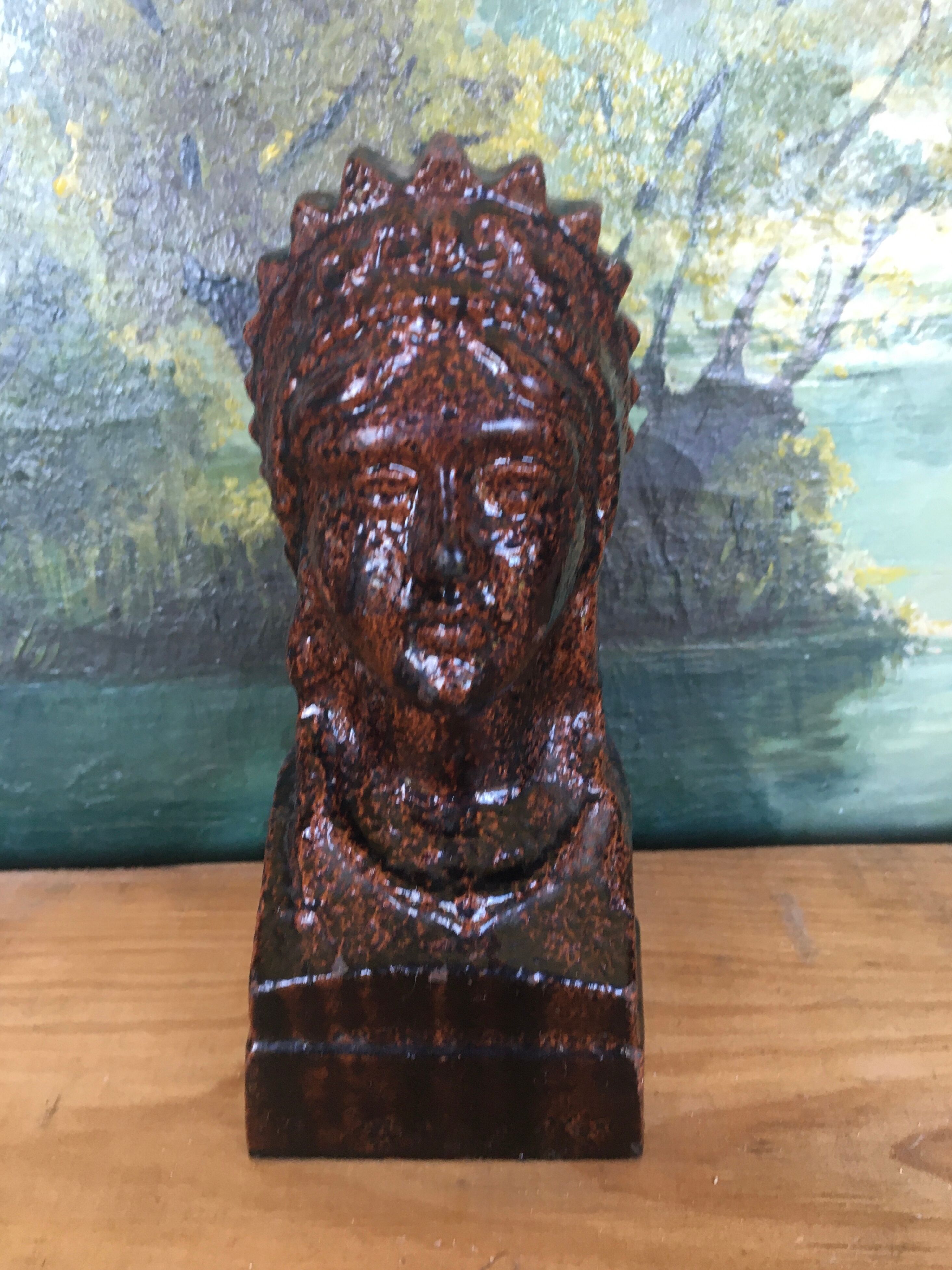Glazed cast iron bust