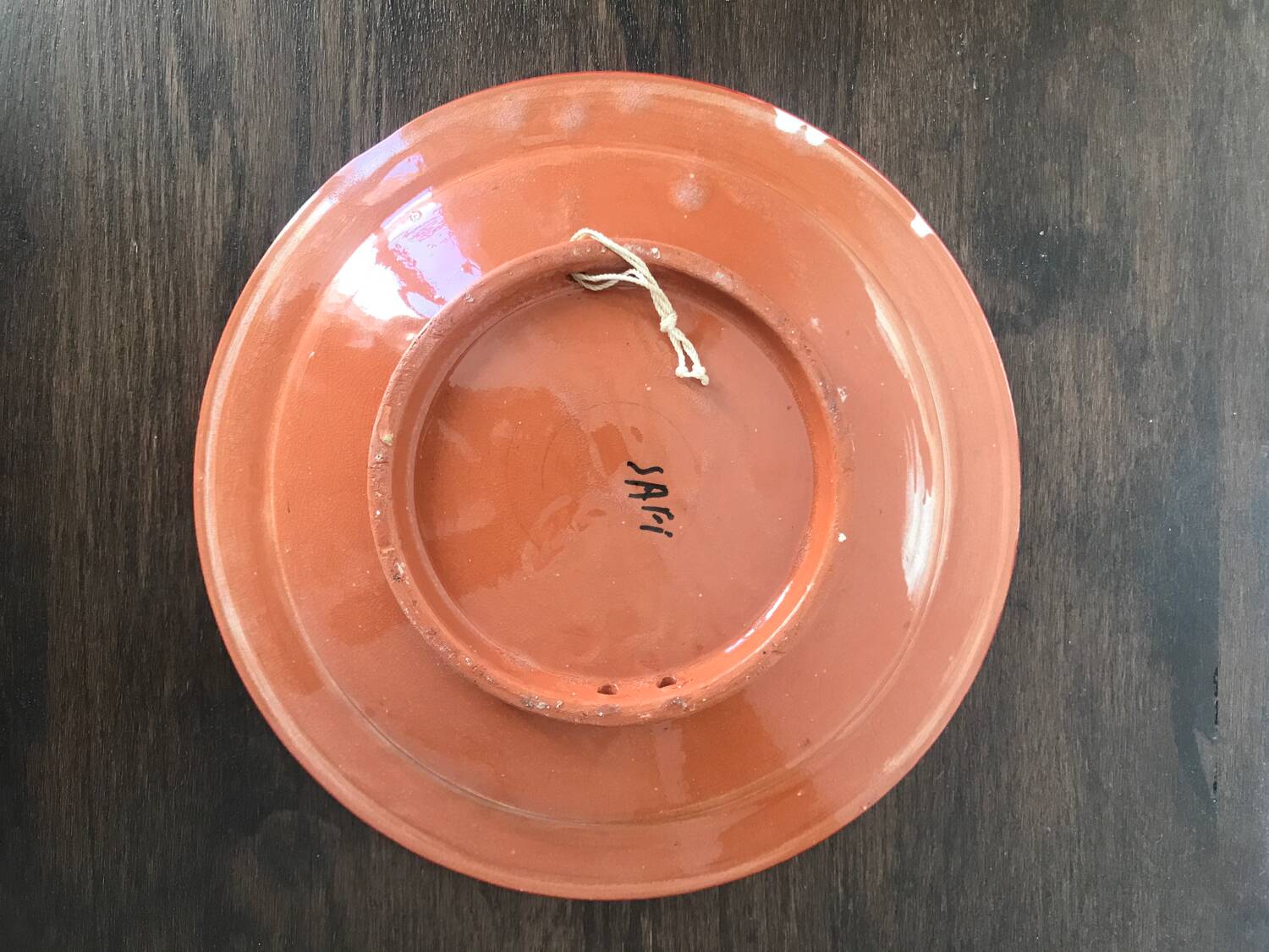 Round Moroccan terracotta dish, striped patterns