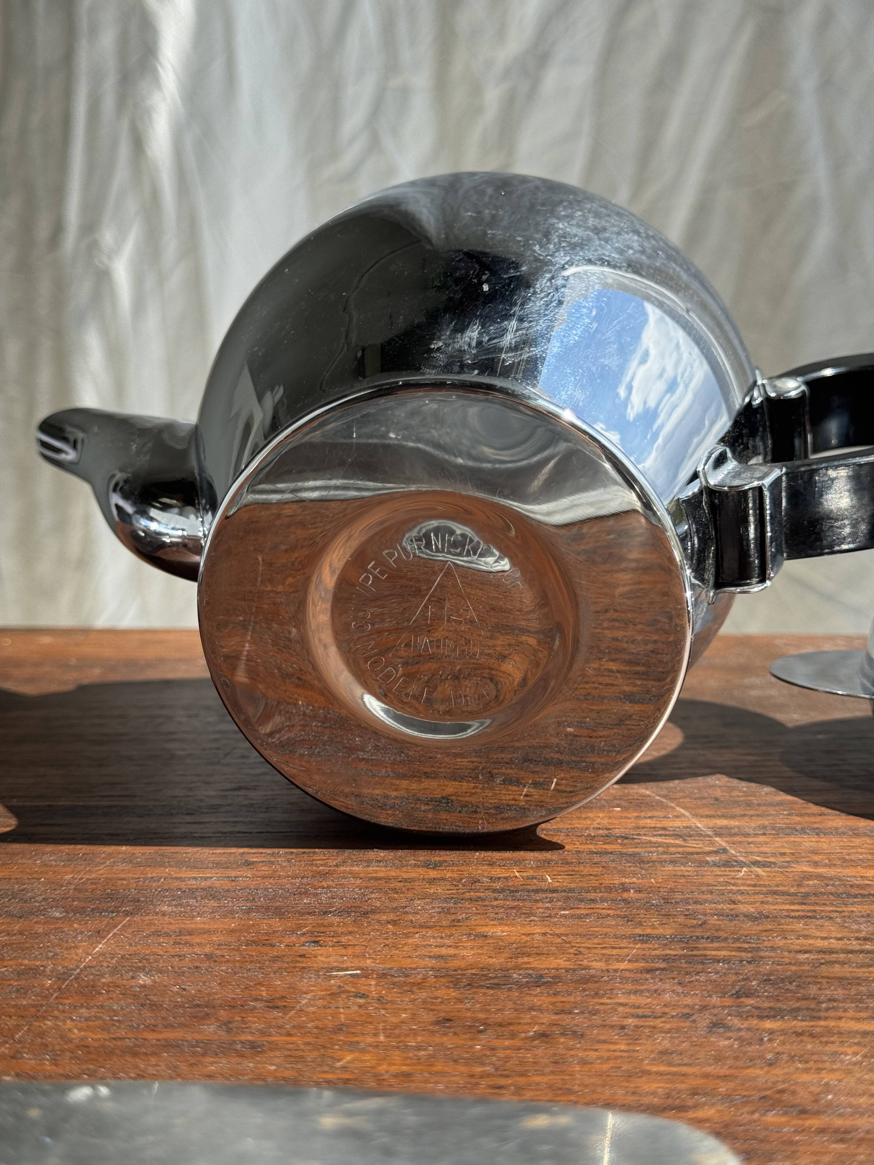 Tea set including teapot, milk jug, sugar bowl and butter dish