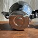 Tea set including teapot, milk jug, sugar bowl and butter dish