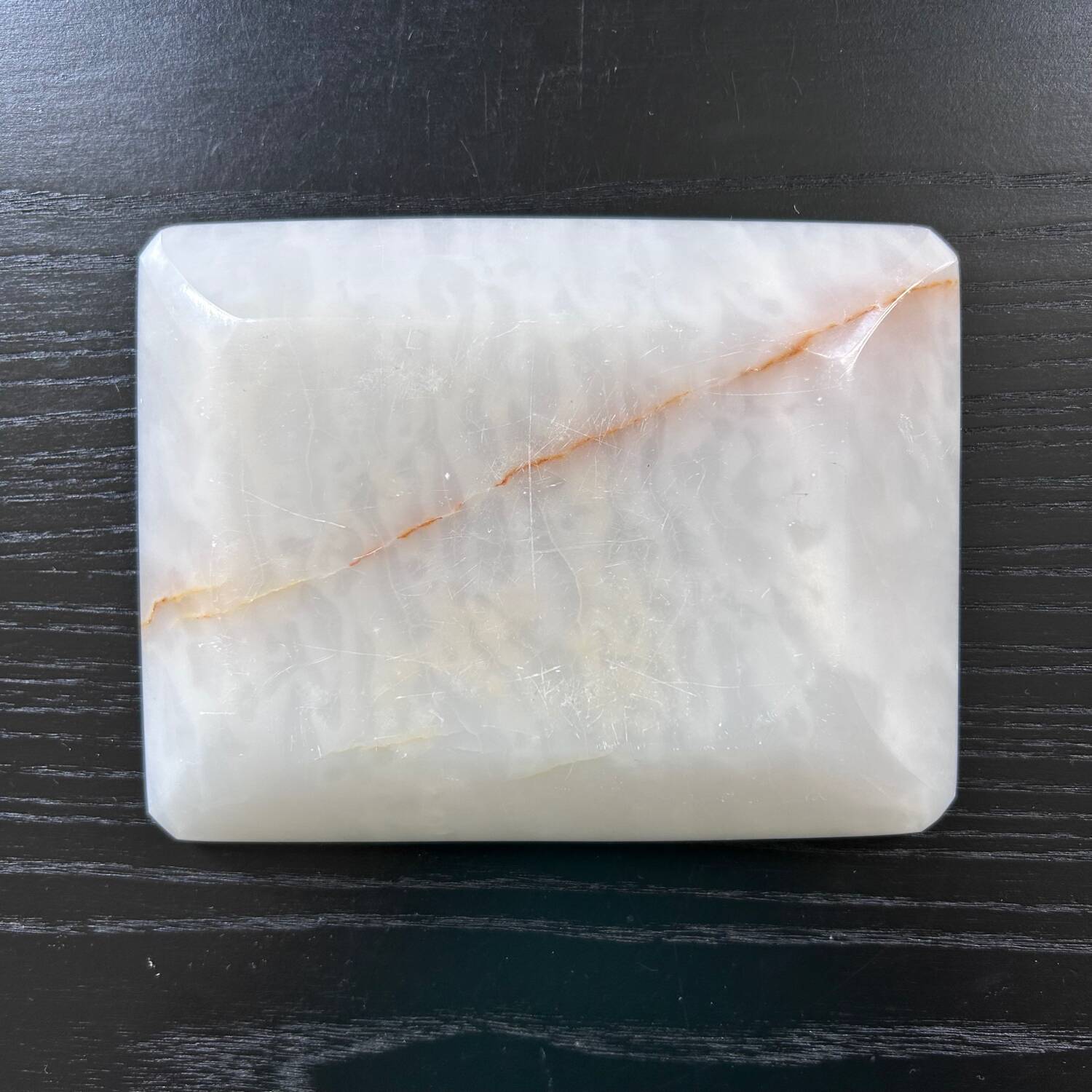 White onyx pocket emptier