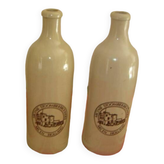 2 old stoneware bottles