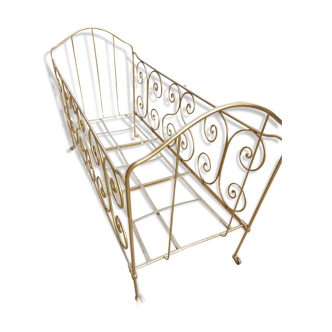 Old wrought iron baby bed