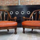 Pair of 60s armchairs in leather and wood