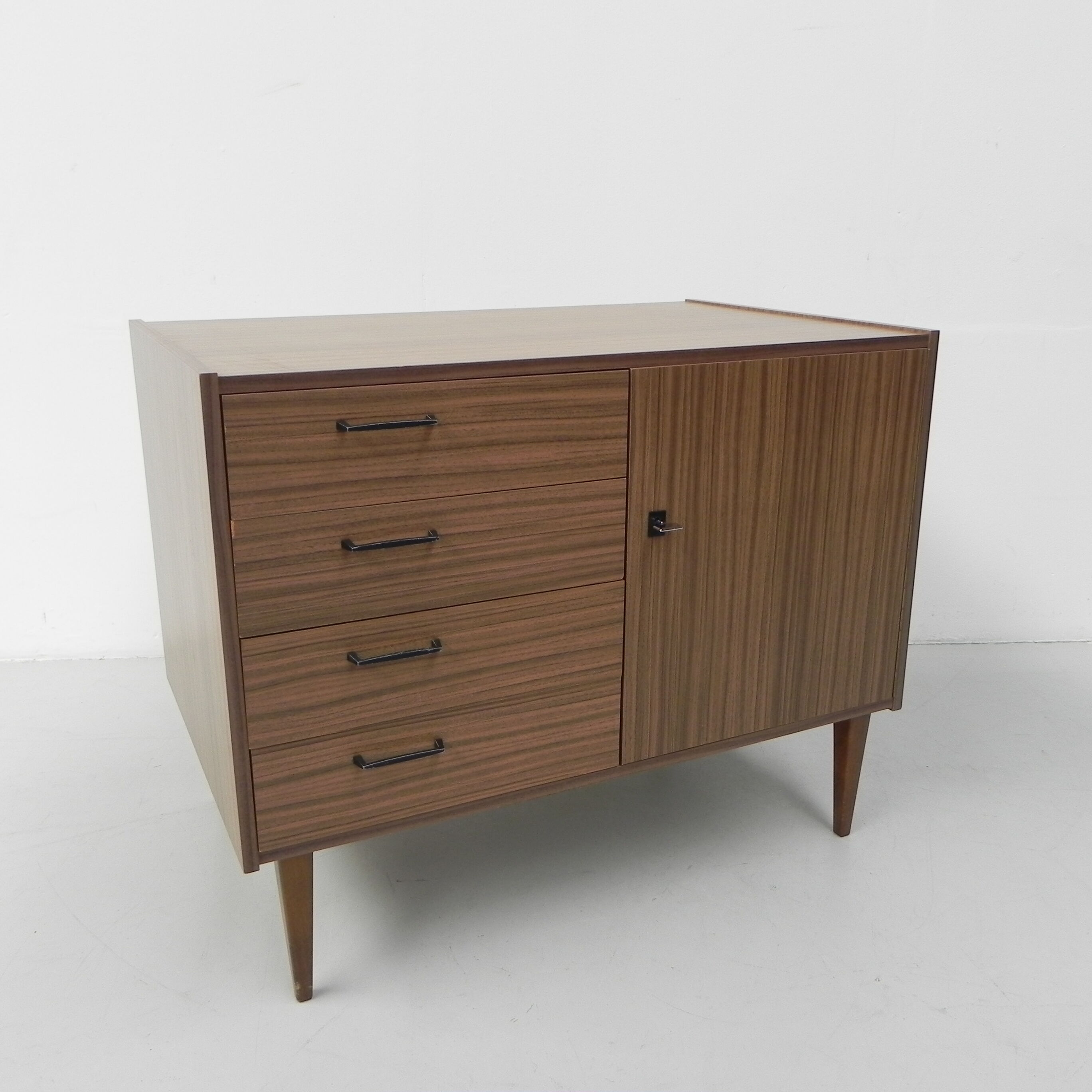 Vintage chest of drawers on tapered legs