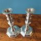 Pair of silver metal candlesticks