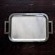 Vintage rectangular tray in shiny silver-plated metal.