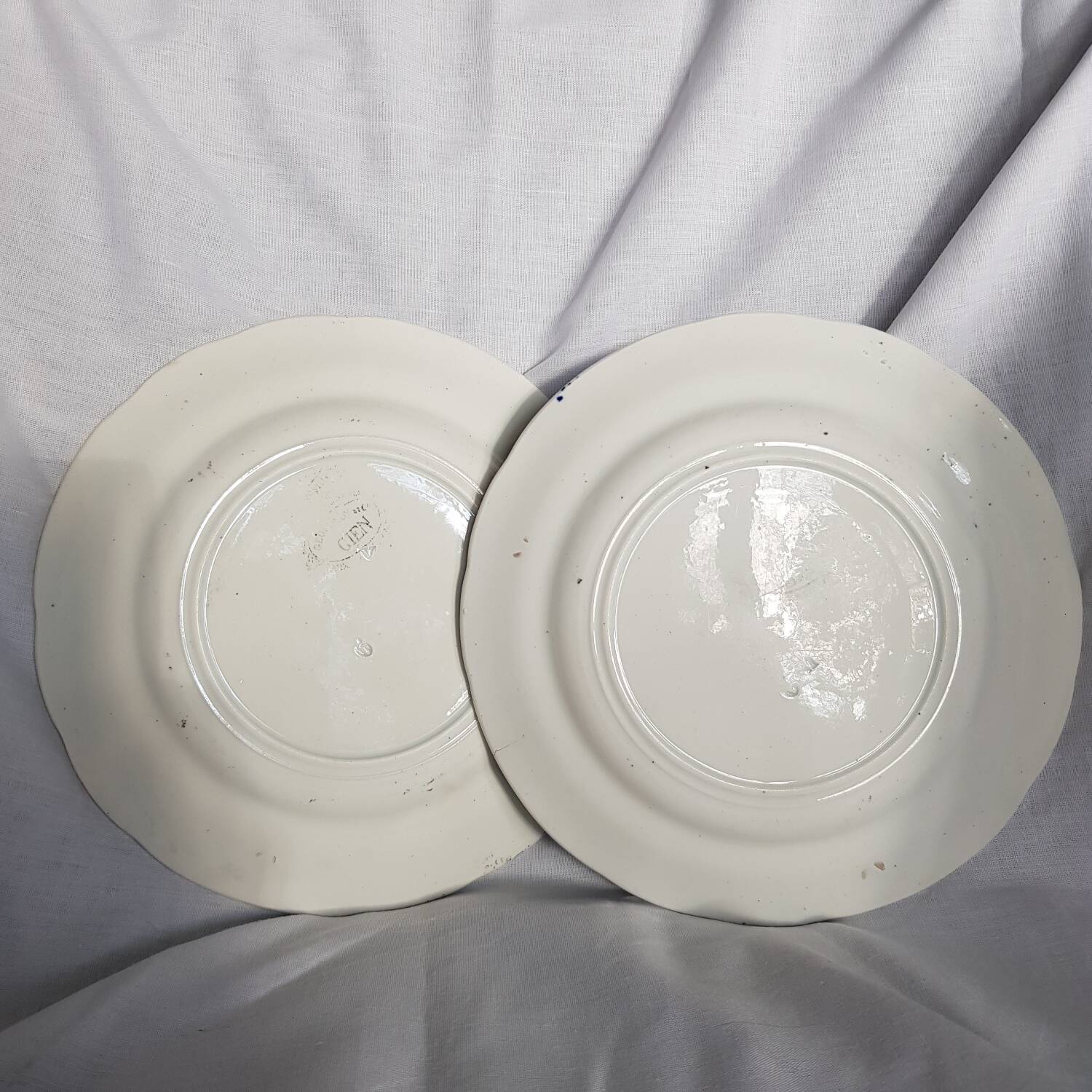 Lot de 2 assiettes parlantes Gien en noir et blanc