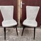 Pair of Chairs Baumann model Essor in imitation white leather, beech compass base