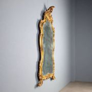 Antique baroque-style mirror in gilded carved wood, Italy 19th century.