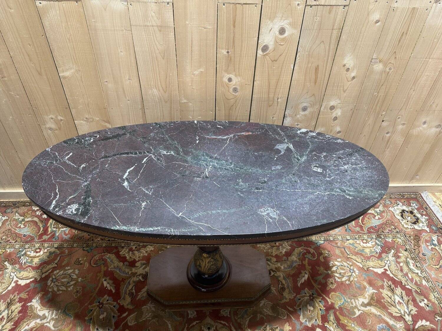 Oval Empire-style gueridon in walnut and marble.